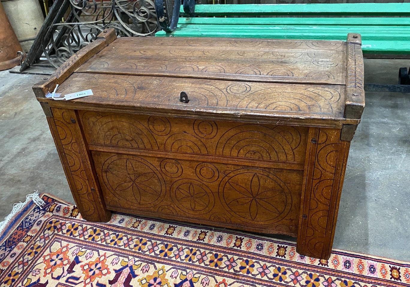 A small Scandinavian carved beech coffer, width 85cm
